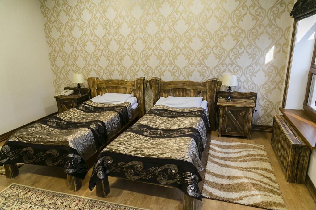 Green Land Hotel Aktobe Habitación foto